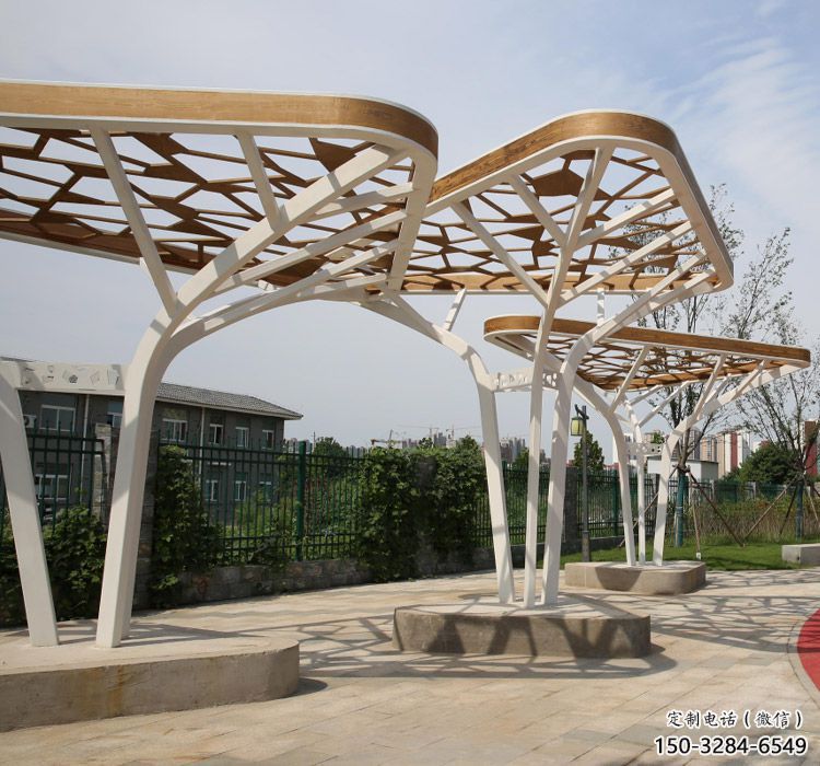 鏤空不銹鋼大樹(shù)葉廊架雕塑 鏤空不銹鋼大樹(shù)葉廊架雕塑